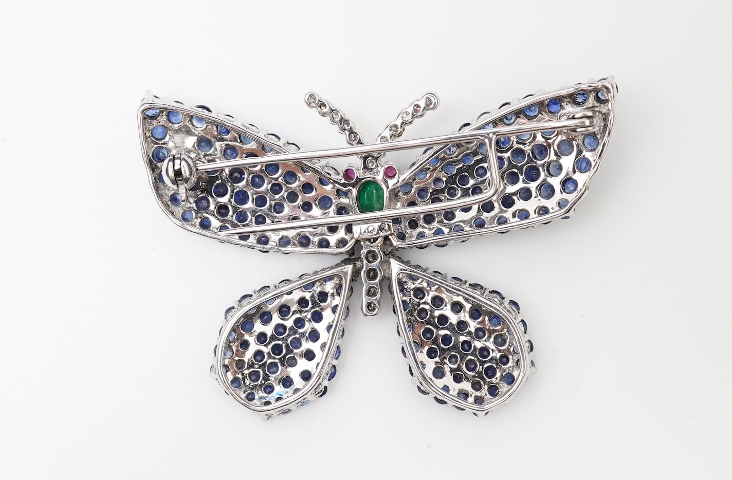 A sapphire, emerald, ruby and diamond brooch